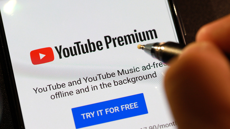 YouTube Premium logo on smartphone