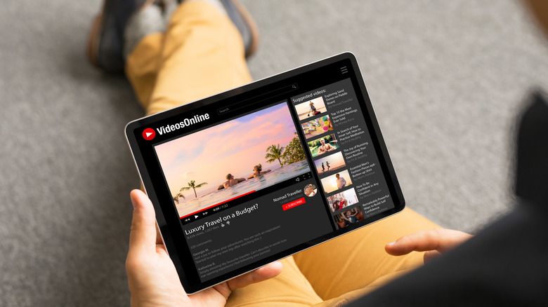 Person watching video on tablet