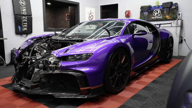 A damaged Bugatti Chiron Pur Sports in a workshop