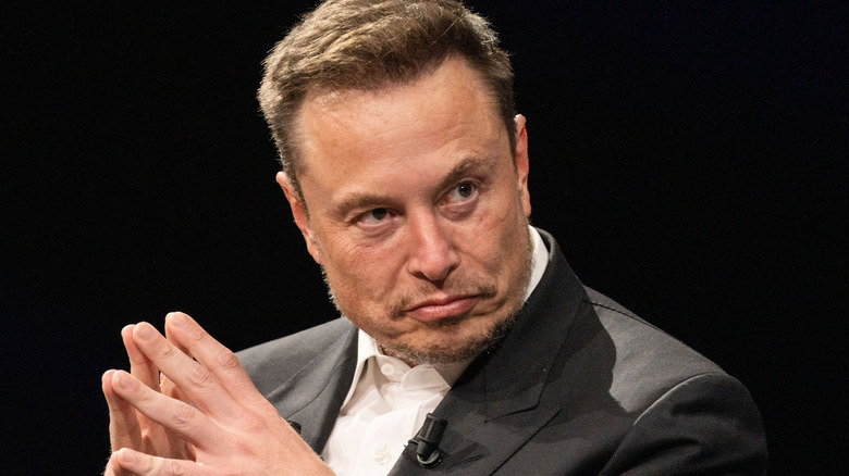 Elon Musk making weird face