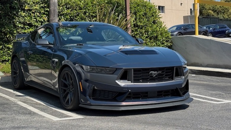 2025 Ford Mustang Dark Horse Premium in a Trader Joe's Parking Lot
