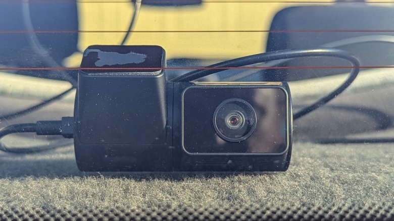 Dash cam in rear window.