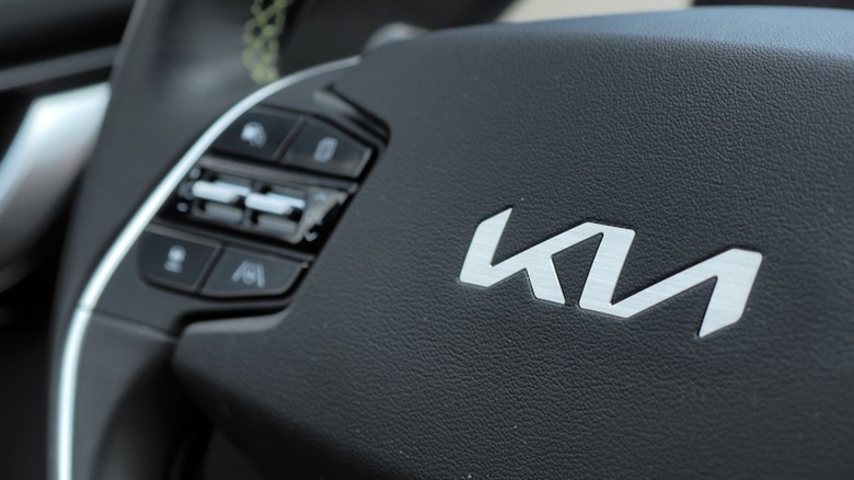 Kia logo on steering wheel