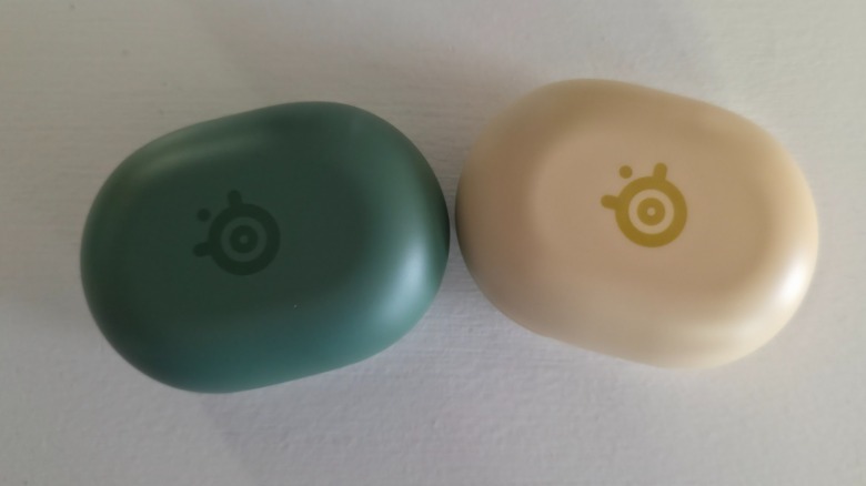 Two Arctis GameBud cases in different colors