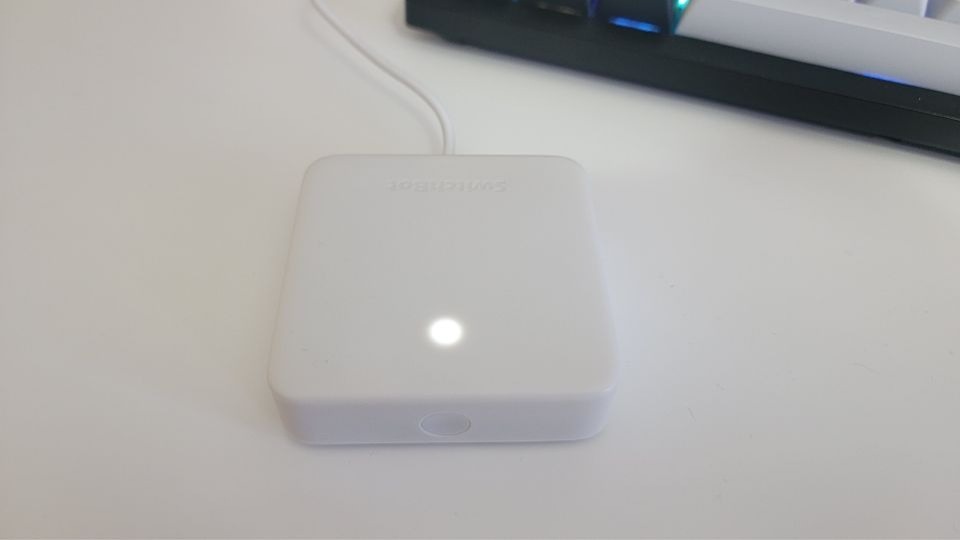 SwitchBot Hub Mini on desk