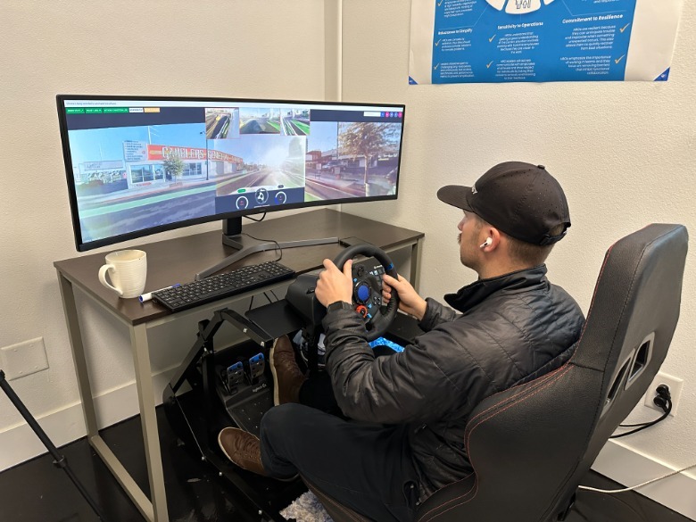 Man remote piloting a car