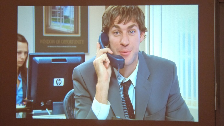 The Yaber T2 Plus Outdoor Projector showing Jim from the Office on a wall.