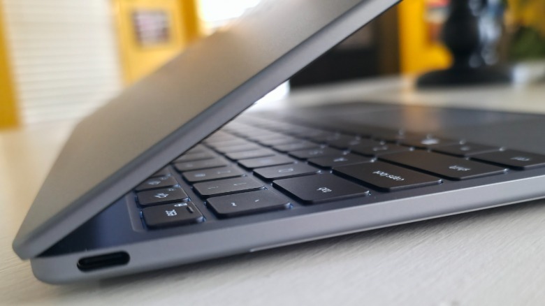 A closeup shot of the Dell XPS 13 showing how thin it is