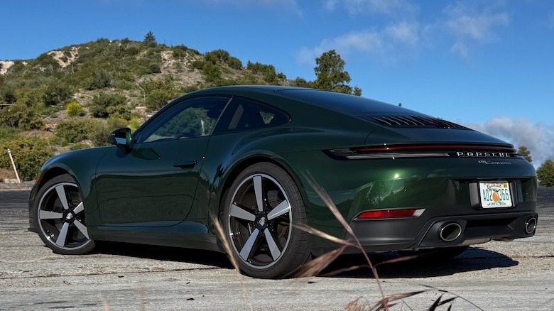 2026 Porsche 911 Carrera 4S rear 3/4 parked in the mountains