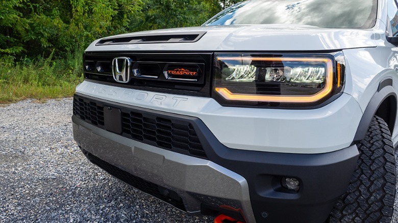 2026 Honda Passport left headlight and TrailSport grille logo