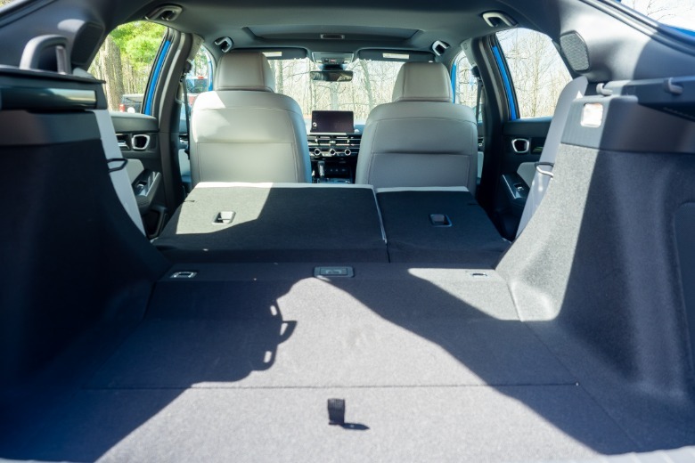 2026 Honda Civic Hatchback Hybrid cargo area with rear seatbacks down