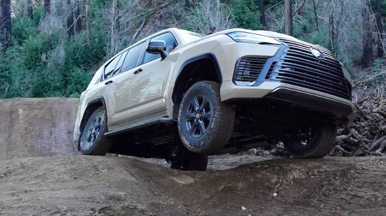2025 Lexus LX 700h Overtrail posing with a wheel up