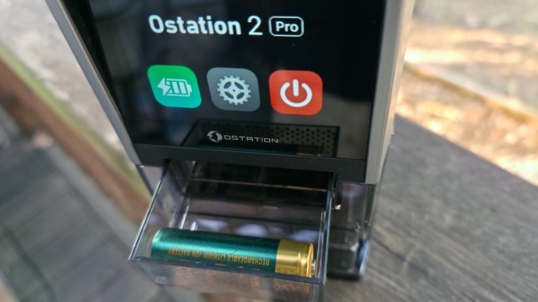 The Ostation 2 Pro with an invalid battery in its rejection bin