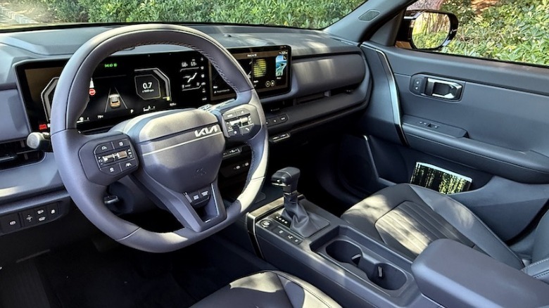 2027 Kia Seltos steering wheel and dashboard