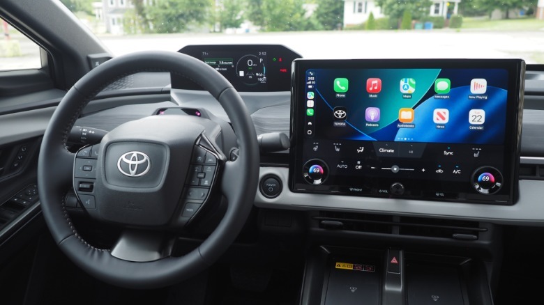 2026 Toyota C-HR dashboard and steering wheel with Apple CarPlay on the touchscreen