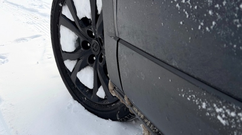 CX-30 front wheel packed with sno