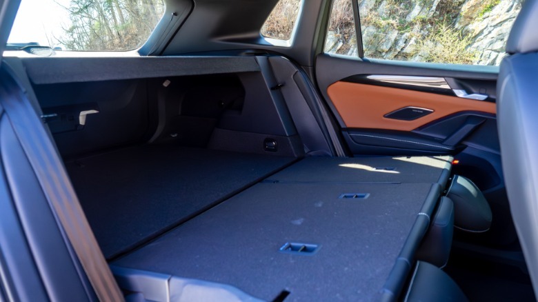 2026 Volkswagen Tiguan SEL R-Line Turbo rear seat backs down with cargo area exposed