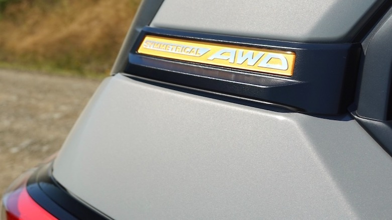 Symmetrical AWD badge