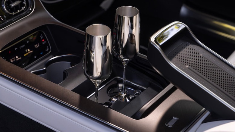 Two silver champagne flutes in Mercedes-Maybach S-Class