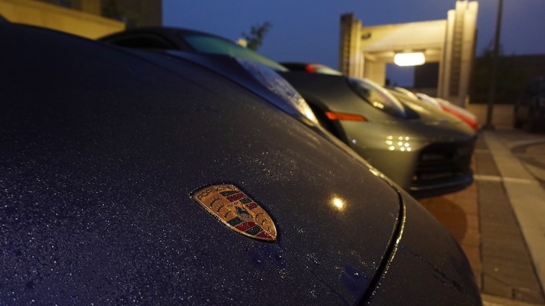 Porsche cars lined up at night