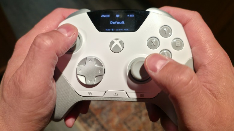 A person using the SteelSeries Aeon Pro Controller