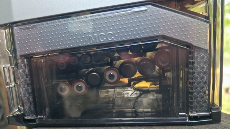 A close-up of the Ostation 2 Pro's battery drop system