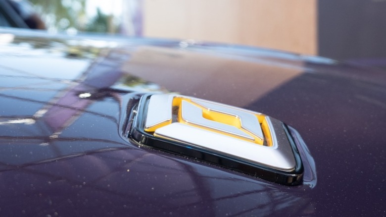 Rivian logo on purple hood