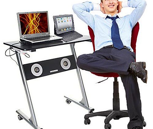 The Sharper Image Compact Computer Desk With Speakers Is Odd