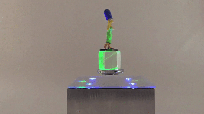 Magic Cube is a levitating laser display for your treasures