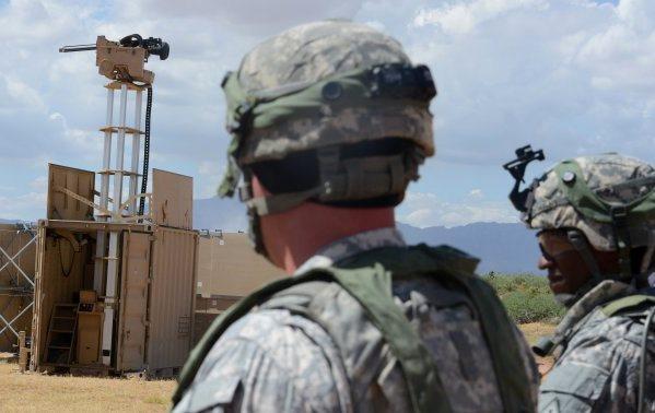 Military testing towers with remote-controlled weapons