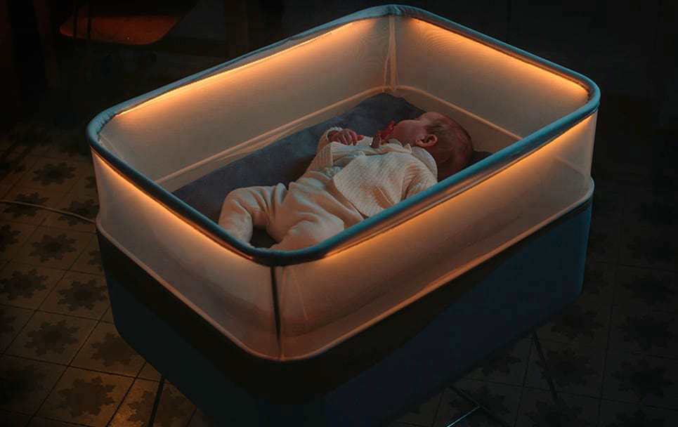 baby crib that simulates car rides 