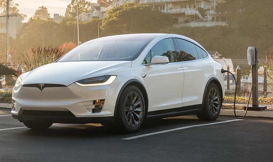 Tesla offers free charging stations for workplace parking lots SlashGear