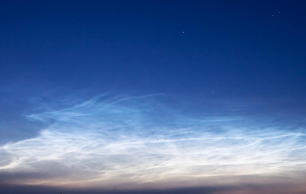 Rare noctilucent clouds dazzled Seattle with starlight this morning