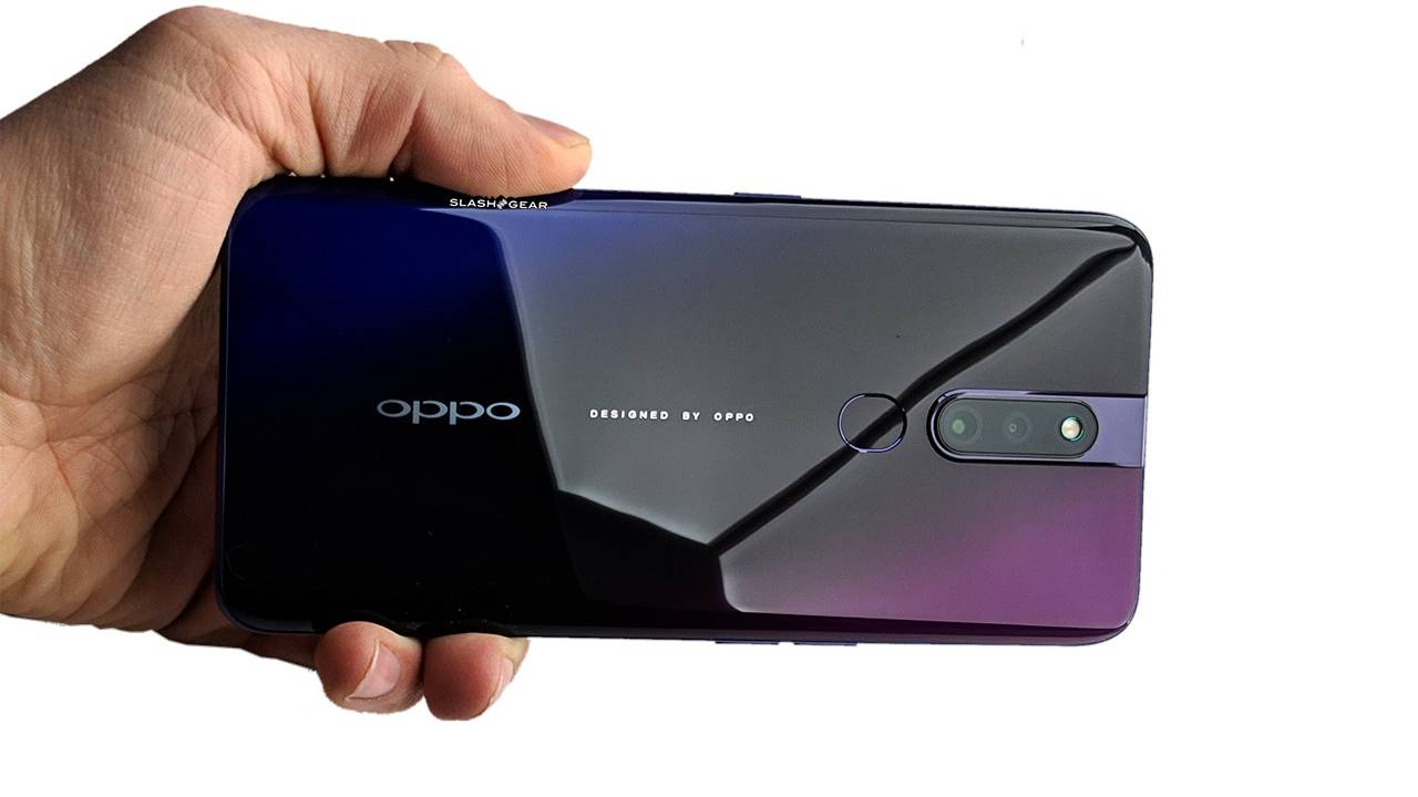 This image has an empty alt attribute; its file name is oppof11pro_holdback-1280x720.jpg