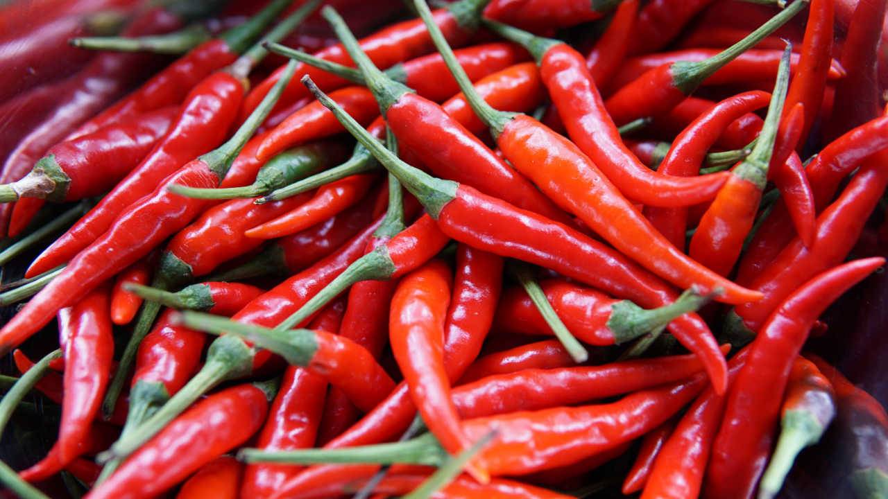 Chili peppers may protect heart health, but only if you eat enough