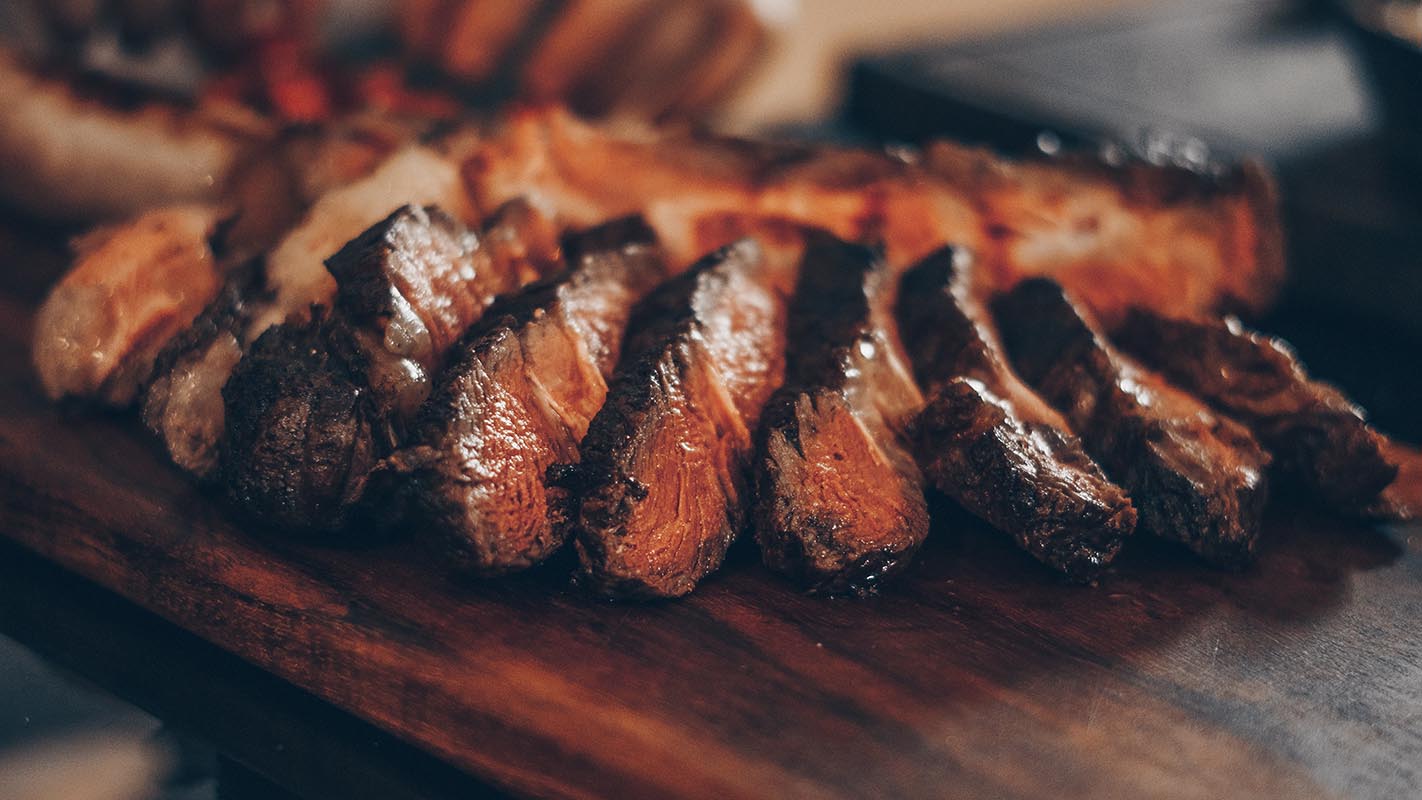 Red meat health risks remain, but changing how it's cooked may help