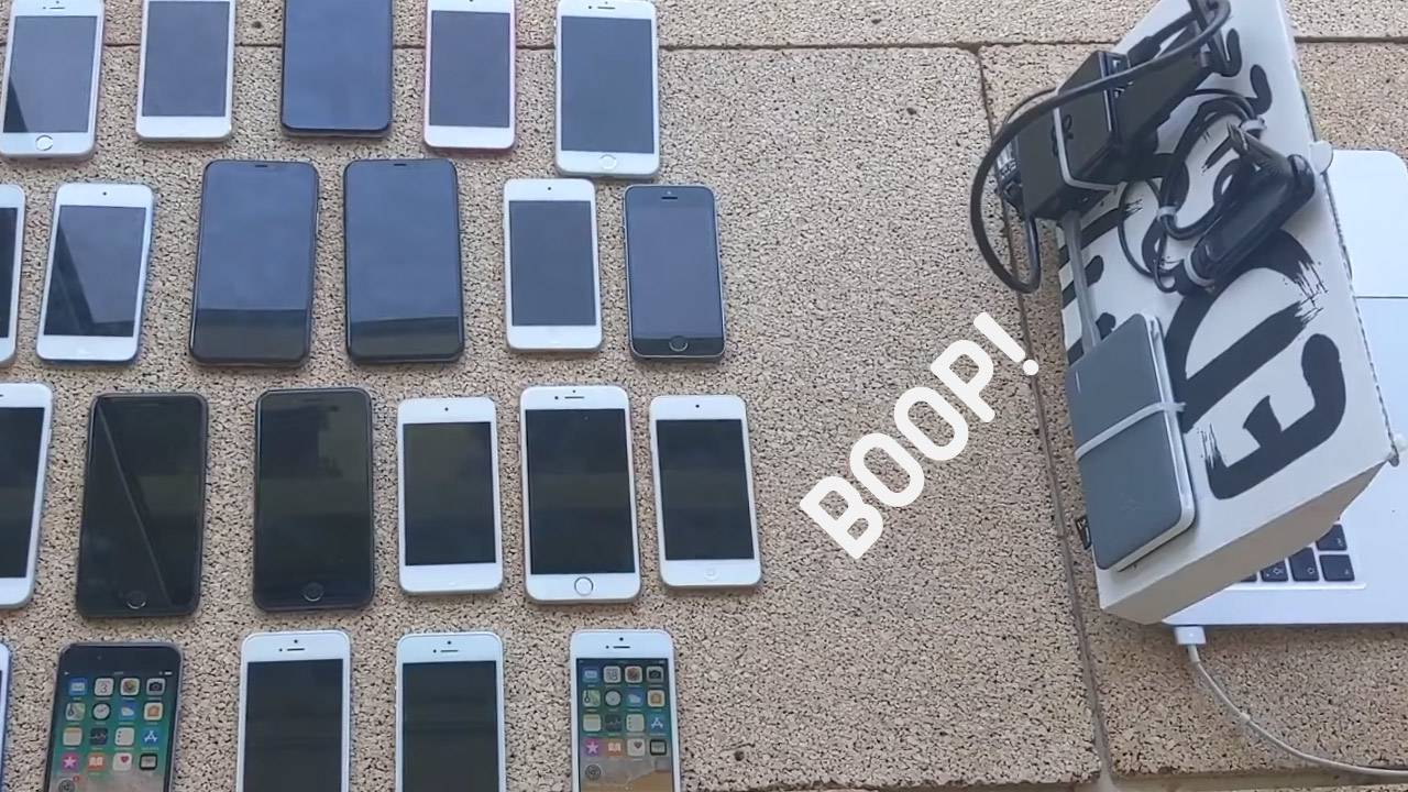 Watch a computer hack 2-dozen iPhones with 1 code – is anything sacred?