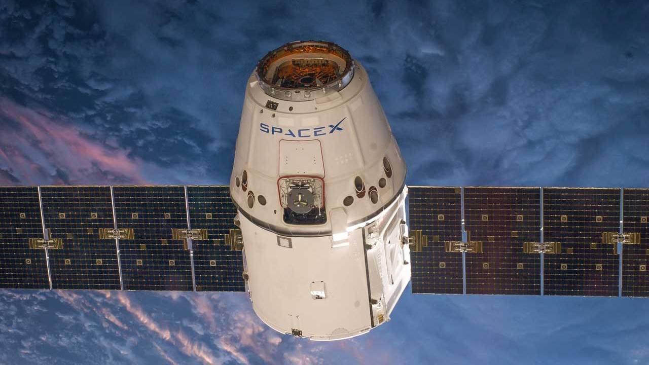 SpaceX scrubs satellite launch attempt minutes before liftoff