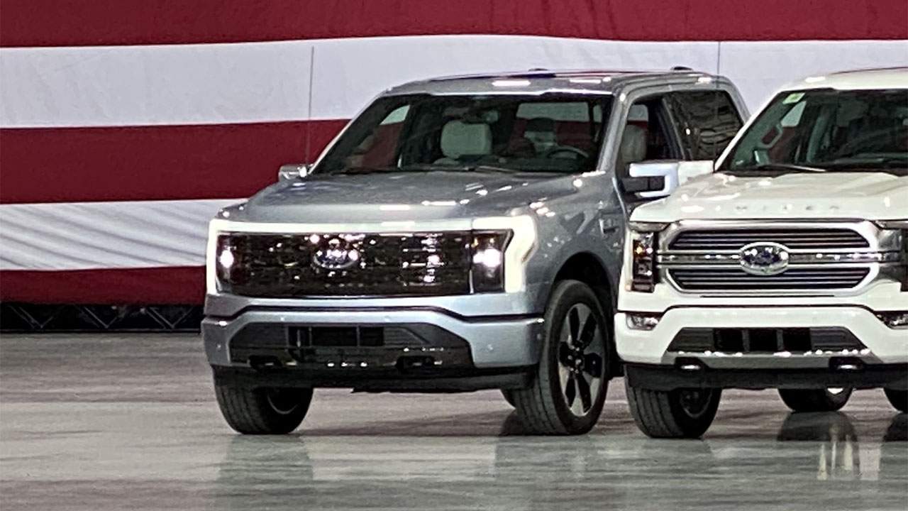 2022 F-150 Lightning pickup spied in the background during a presidential visit