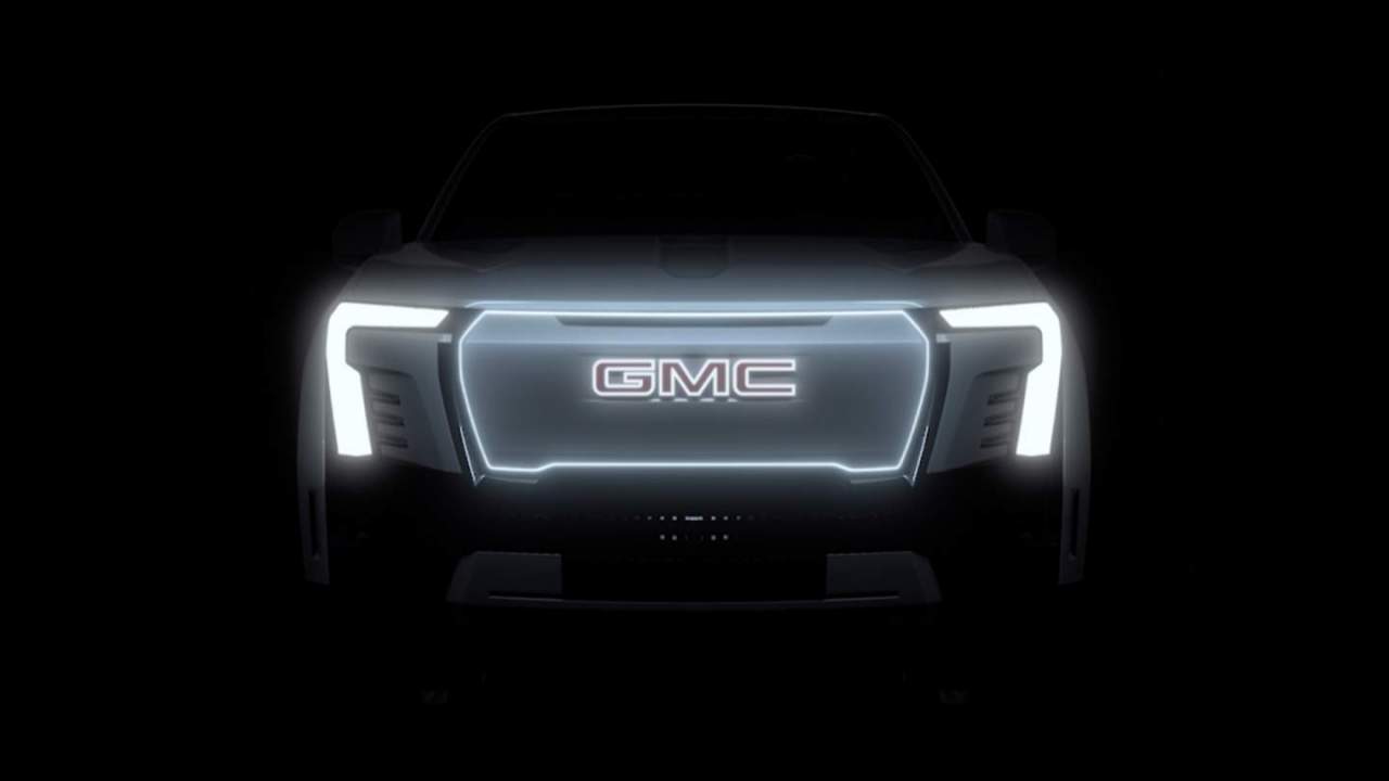 Watch the all-electric GMC Sierra wake up to battle Ford’s Lightning
