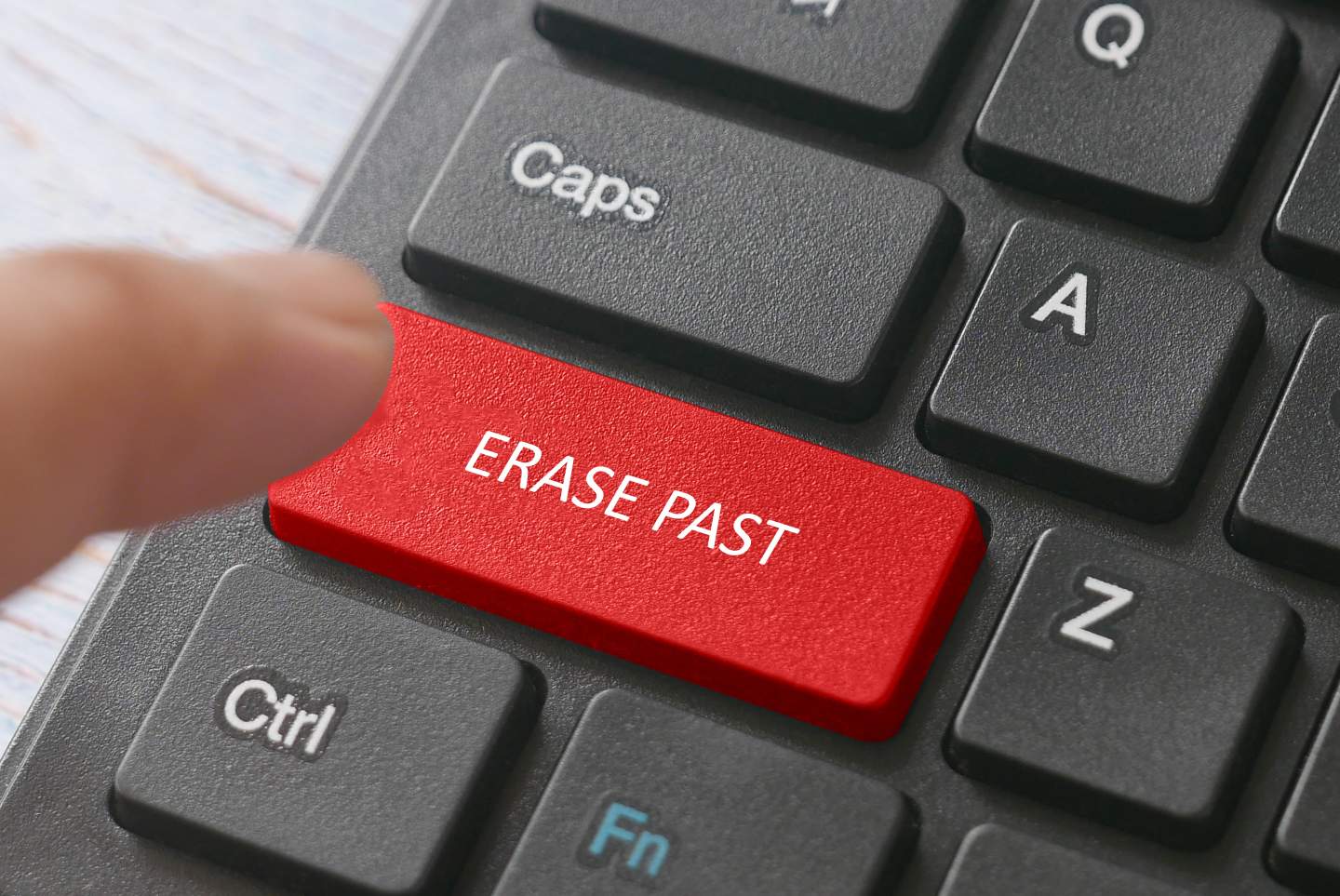 Finger hovering over button labeled "erase past"