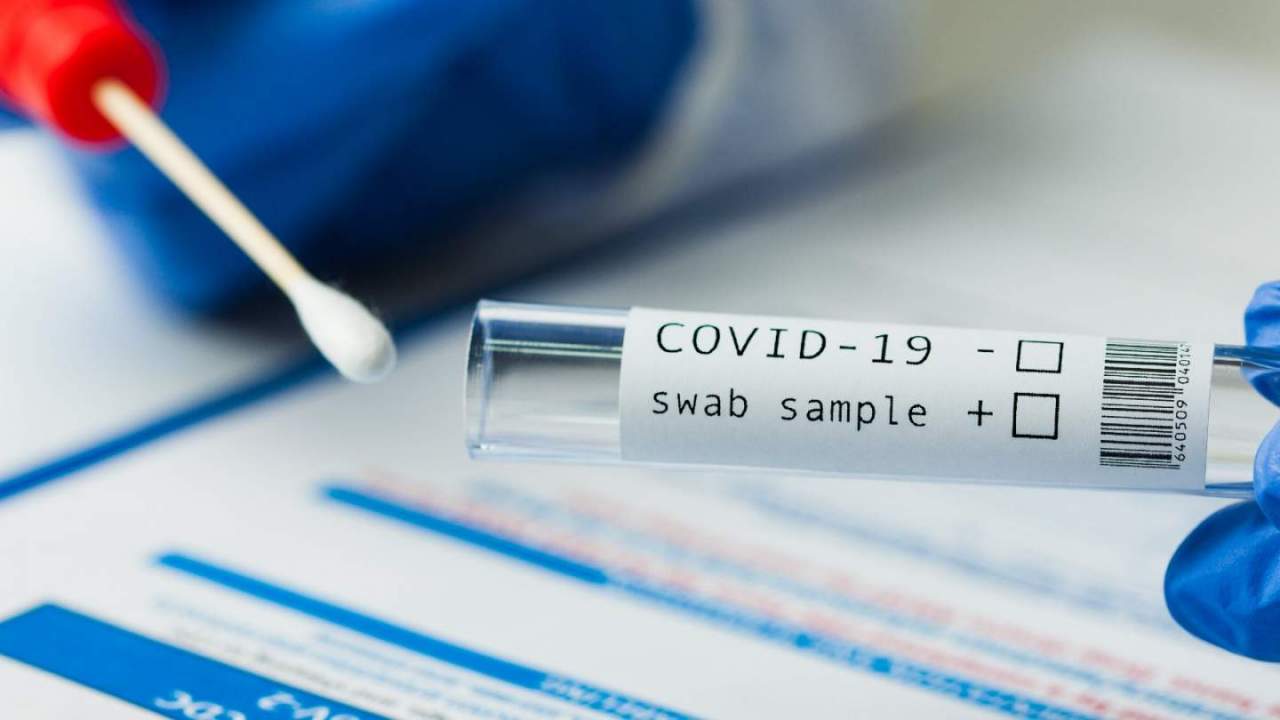 COVID-19 test tube and swab