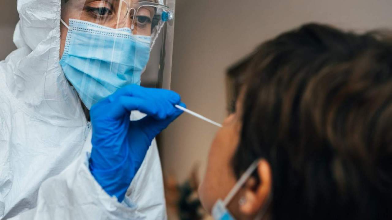 Woman getting nasal swab