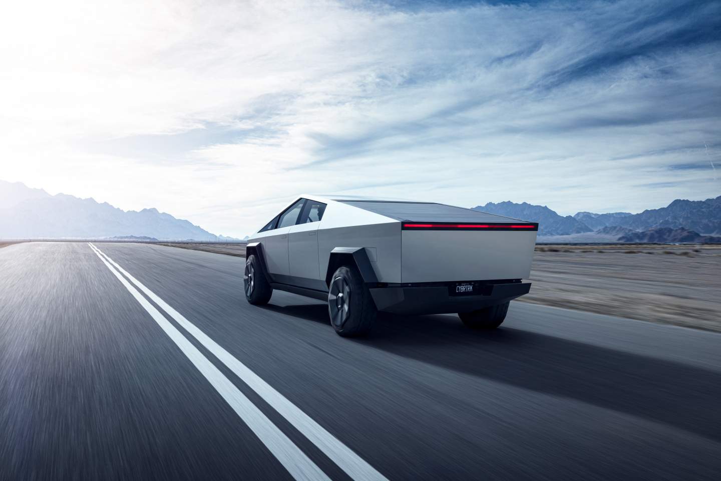 Tesla Cybertruck electric pickup on a highway