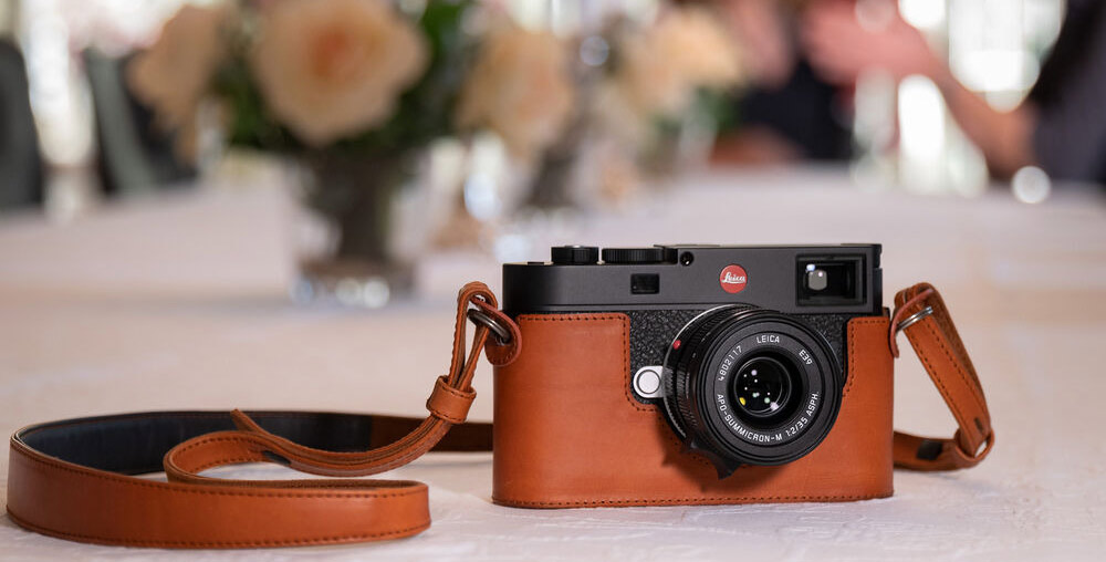 The Leica M11 in black with optional leather case 