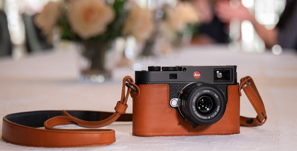 The Leica M11 in black with optional leather case
