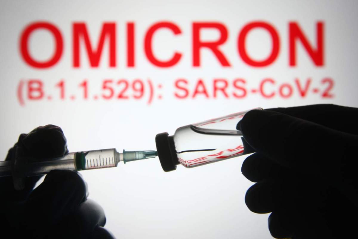 Omicron behind syringe